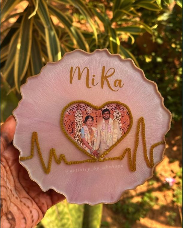 Pink resin wedding keepsake with heartbeat line and couple photo